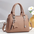 Sac à main élégant en cuir mauve avec charm étoile et bandoulière amovible - Violet
