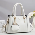 Detail of white pleated tote bag with golden hardware and matching mini charm pouch - White
