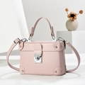 Pink trunk-style leather handbag with silver hardware and adjustable shoulder strap - Pink
