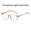 Classic transparent light grey square frame glasses with stylish silver rivet details - Transparent Light Gray