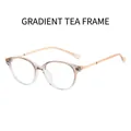 Stylish round blue light blocking glasses featuring a gradient tea and transparent frame - Gradient Tea Frame