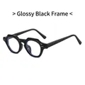 Occhiali anti-luce blu con montatura spessa nero lucido e rivetti metallici - Montatura nero lucido
