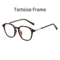 Classic tortoiseshell round frame glasses with anti-blue light metal temple accents - Tortoiseshell Frame