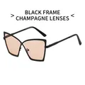 Modieuze oversized cat-eye zonnebril met zwart montuur en champagnekleurige glazen - Zwart Frame Champagne Lenzen