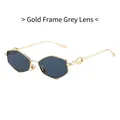 Chique zeshoekige zonnebril met goudkleurig montuur en zwart-grijze lenzen voor een moderne look - Gouden Frame Zwart Grijs