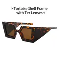 Lunettes de soleil géométriques en écaille avec verres marrons et branches larges - Monture Écaille de Tortue Verres Thé