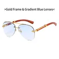 Gafas de sol aviador sin montura con marco dorado, lentes azules y patillas de madera - Montura Dorada Lente Azul Degradado