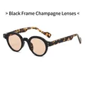Gafas de sol redondas TR90 con montura negra, lentes champán y patillas con estampado leopardo - Montura Negra Lentes Champaña