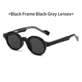 Gafas de sol redondas vintage TR90 con montura negra, lentes grises y detalles plateados - Montura Negra Lentes Gris Negro