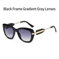 Retro cat-eye zonnebril met zwart montuur, grijze verloopglazen en gouden pootjes - Zwart Montuur Verloop Grijs Lens