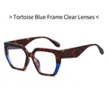 Fashionable tortoiseshell glasses with blue frame accents and clear lenses in a 45-degree view - Tortoiseshell & Blue Frame Clear Lens