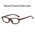 Modern oval sunglasses with translucent brown frames and clear lenses for unisex style - Tea Frame Clear Lens