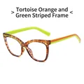 Occhiali cat-eye con montatura tartarugata classica e stanghette a righe arancio e verdi - Montatura a Righe Tartaruga Arancione Verde