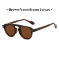 Lunettes de soleil rondes vintage avec monture thé transparente et détails argentés - Monture Thé Transparente Verres Thé