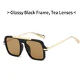 Gafas de sol cuadradas negro brillante con lentes té y patillas doradas - Montura negra brillante lentes té