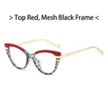 Occhiali cat-eye con montatura bicolore rosso e nero testurizzato e stanghette in metallo oro - Montatura Superiore Rossa e Inferiore Nera a Rete