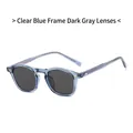 Retro TR90 round sunglasses featuring transparent blue frames and dark grey lenses - Transparent Blue Frame Black Gray Lens