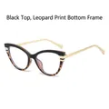 Cat eye glasses featuring upper black and lower leopard print frames with gold temples - Black Leopard