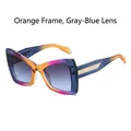 Cat-eye sunglasses with orange gradient frame, grey-blue lenses and gold accents - Orange Frame Gray Blue Lens
