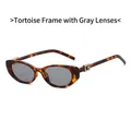 Schicke Sonnenbrille mit Schildpatt-Rahmen, grauen Gläsern und Goldakzenten - Schildpatt Rahmen Graue Gläser