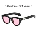 Chic cat eye sunglasses featuring a black frame with pink lenses and silver metal accents - Black Frame Pink Lens