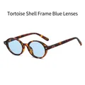 Classic round sunglasses with tortoise frame and light blue lenses for a retro style - Tortoise Frame Blue Lens