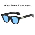 Retro cat-eye sunglasses with black glossy frames and vibrant blue lenses - Black Frame Blue Lens