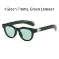 Retro cat-eye sunglasses with dark green frames and translucent green lenses - Green Frame / Green Lens