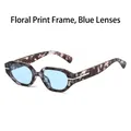 Floral print frame sunglasses with translucent blue lenses and golden metal accents - Floral Frame Blue Lenses