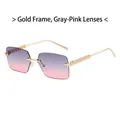 Randloze zonnebril met gouden metalen pootjes en grijs-roze verloopglazen - Gouden Frame Grijs Roze Lenzen