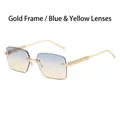 Randloze zonnebril met goudkleurige metalen klinknagelpootjes en blauw-gele verloopglazen - Gouden Frame Blauw-Geel Verlooplenzen