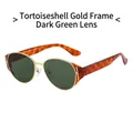 Retro cat-eye sunglasses with gold metal frames, tortoise temples, and dark green lenses - Tortoise Gold Frame Dark Green Lens