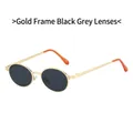 Ovale Retro-Sonnenbrille mit goldenem Metallrahmen, grauen Gläsern und orangefarbenen Bügeln - Goldrahmen Schwarzgrau