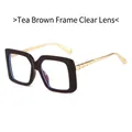 Square tea frame sunglasses with gold metal temples and transparent clear lenses - Tea Frame Clear Lens