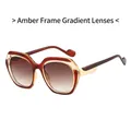 Gafas de sol oversize de moda con montura té y lentes degradadas con detalles metálicos dorados - Montura Té Transparente Lente Degradado Té