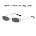 Minimalist silver metal oval sunglasses with dark grey lenses and adjustable nose pads - Silver Frame Black Grey Lens