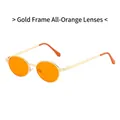 Retro oval sunglasses with gold metal frame and vibrant orange lenses for a trendy look - Gold Frame Orange Lenses