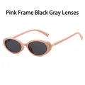 Retro oval sunglasses featuring a matte pink frame with dark grey tinted lenses - Pink Frame Dark Grey Lens