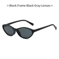 Lunettes de soleil œil-de-chat tendance avec monture noire et verres gris foncé - Monture Noir Brillant Verre Gris