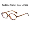 Retro oval sunglasses featuring a glossy tortoiseshell frame and clear white lenses - Demi Frame Clear Lens