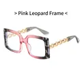 Pink leopard print square sunglasses with bold golden chain temples on white background - Pink Leopard Frame Clear Lenses