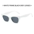Chic cat eye sunglasses with a thick white frame and dark grey lenses for a trendy look - White Frame Dark Grey Lens