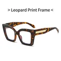 Vintage Katzenaugen-Sonnenbrille mit Leopardenmuster und goldener Metallverzierung - Leopardenmuster Rahmen