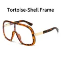 Fashionable oversized leopard print sunglasses with sleek golden metal temples - Leopard Frame