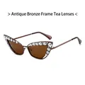 Cat-Eye-Sonnenbrille aus Bronze-Metall mit braunen Gläsern und weißen Perlen-Details - Bronzerahmen Braune Gläser