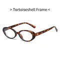 Oval anti-blue light glasses with a vintage tortoise shell frame and metal accents - Tortoise Frame Clear Lens