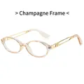 Champagne oval blue light blocking glasses with gold metal temples and hollow design - Champagne Frame Transparent Lens