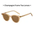 Vintage champagnekleurige zonnebril met bruine glazen en een stijlvol retro design - Champagnekleurig Frame / Theekleurige Lenzen