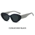 Occhiali da sole retrò cat-eye con montatura traslucida grigio-blu e lenti scure - Montatura Grigio Blu Lenti Grigio Nero