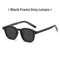 Classic vintage sunglasses with black frame, dark grey lenses, and silver rivet accents - Black Frame Black Grey Lens